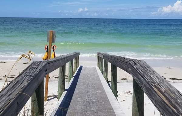 How Far is Anna Maria Island from Orlando? Coastal Paradise 2 distance to anna maria island to orlando - beach entrance